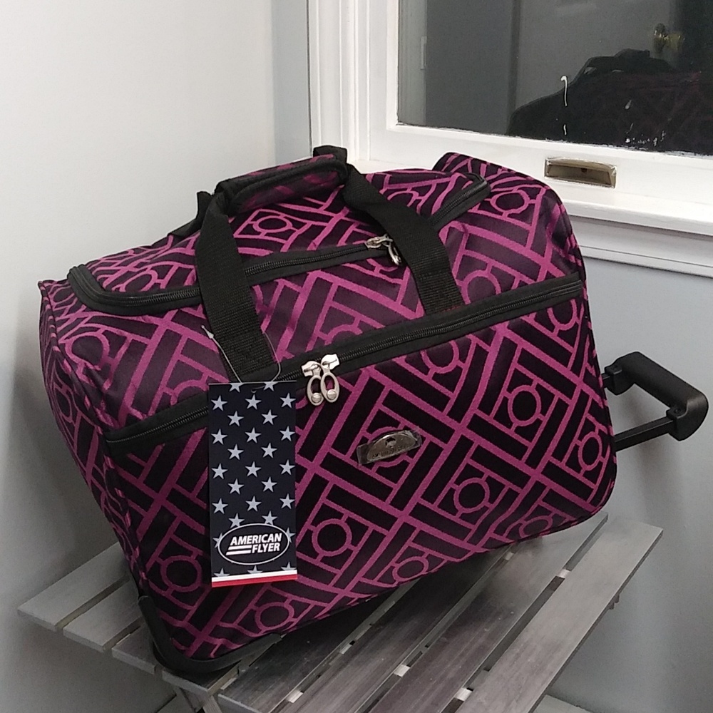 18 inch carry-on wheeled duffel- Astor Purple/Black.